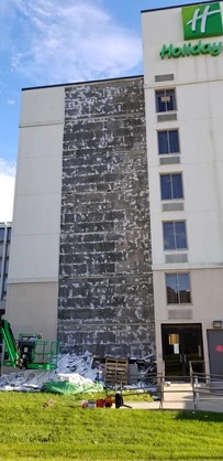 EIFS repair services for hotel water damage